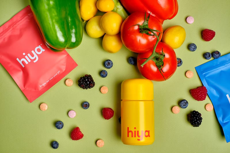 a bunch of fruits and vegetables representing hiya vitamin supplements