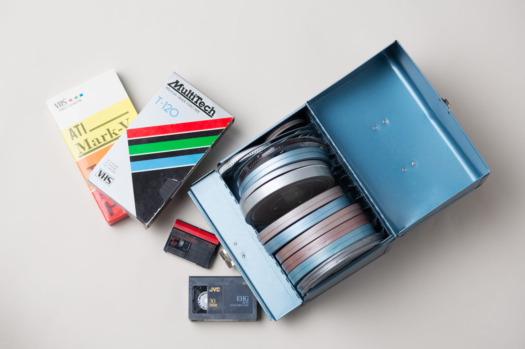 a bunch of 8mm film to dvd an even vhs tapes